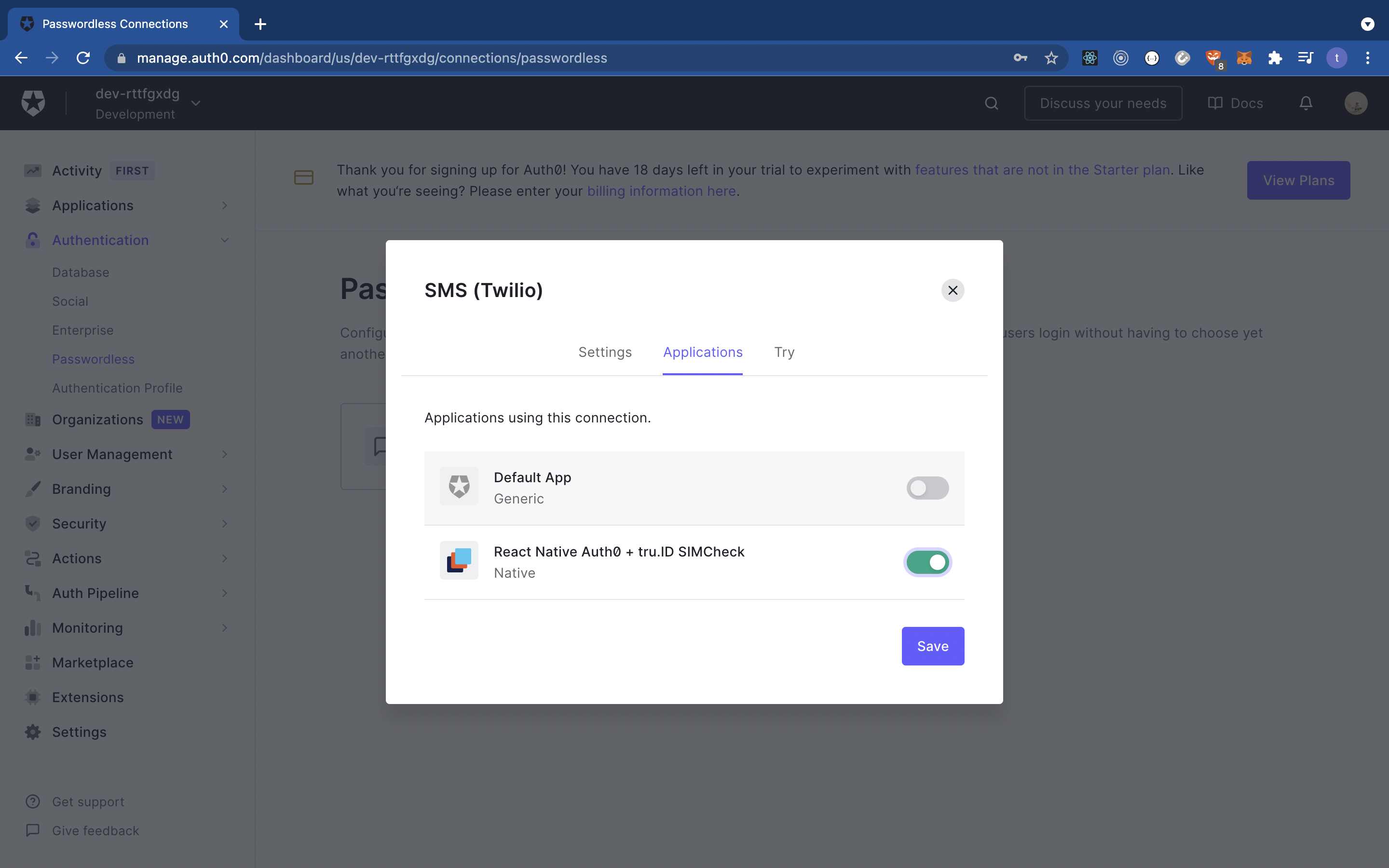 A screenshot of the Auth0 dashboard, with the SMS Twilio dialog open asking users to define which application to enable the SMS Passwordless authentication on.