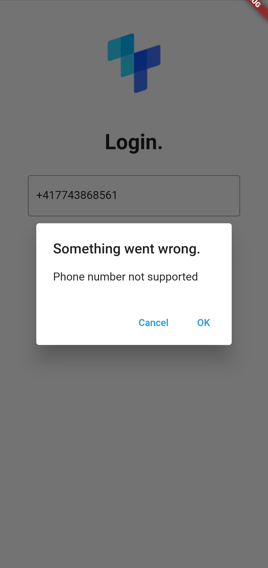 A tru.ID mobile app screen with a modal overlaid with the title 'something went wrong' and a message saying 'phone number not supported' 