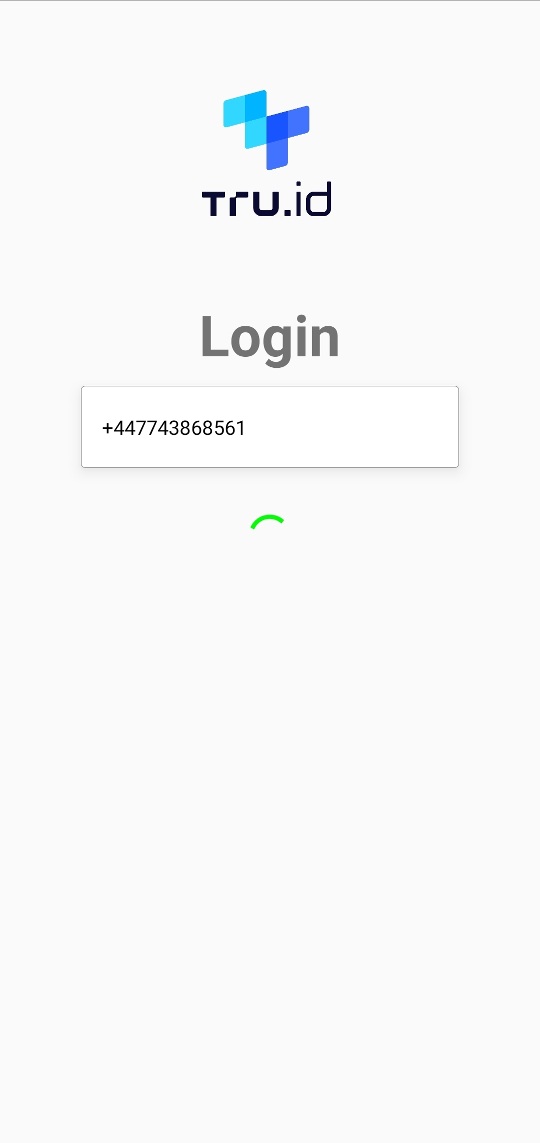 A tru.ID mobile app screen with the tru.ID logo, a phone number text input and a loading indicator.