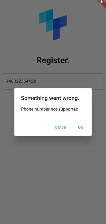A tru.ID mobile app screen with a modal overlayed with the title 'something went wrong' and a message saying 'phone number not supported' 